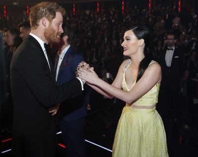 Prince Harry and Kacey Musgraves Greeting Each Other