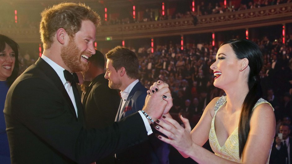 Prince Harry and Kacey Musgraves Greeting Each Other
