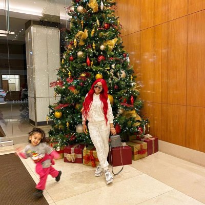 Dream Kardashian Blac Chyna Smile in Front of a Christmas Tree