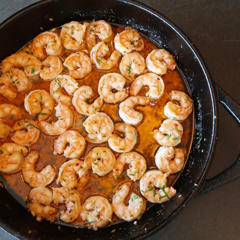 Chrissy-Teigen-shrimp-with-John's-Rose-March-28