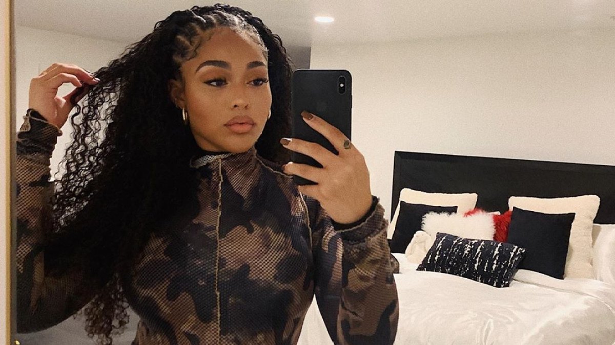 Jordyn Woods Poses for a Mirror Selfie in Camo Bodysuit
