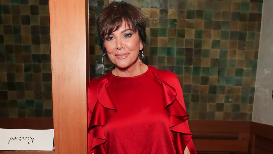 Kris Jenner Wearing a Red Dress and Posing