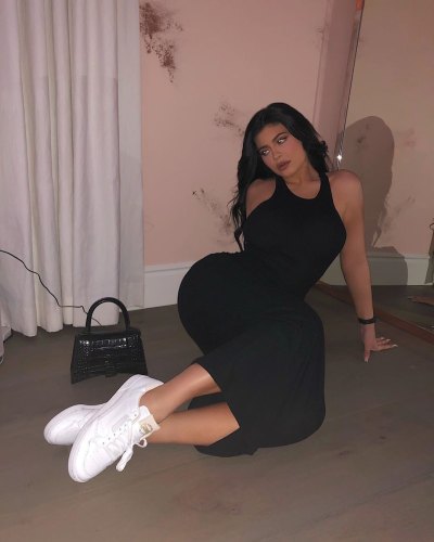 Kylie Jenner Wearing a Black Dress With a Birkin Bag