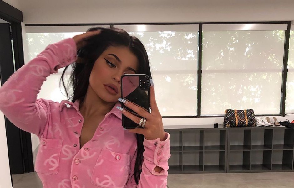 Kylie Jenner Wearing a Pink Top While Taking a Mirror Selfie