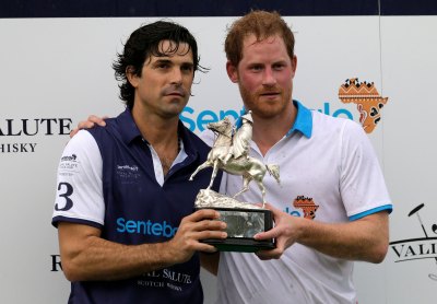 Prince Harry Holding a Trophy With Nacho Figueras