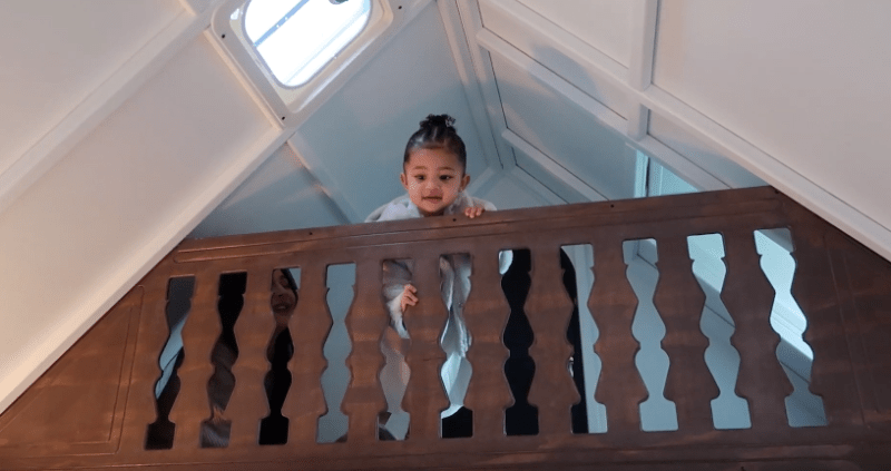 Stormi Webster Stands in Dollhouse Christmas Gift From Kris Jenner
