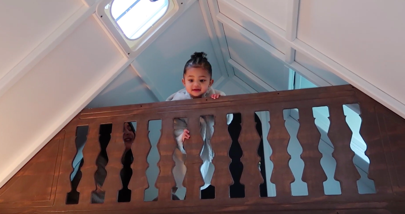 Stormi Webster Stands in Dollhouse Christmas Gift From Kris Jenner