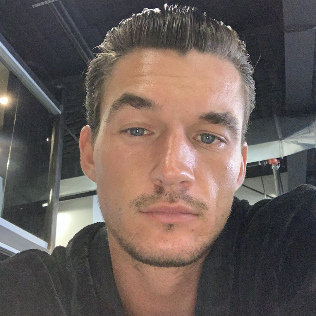 Tyler Cameron Sporting Slicked Hair