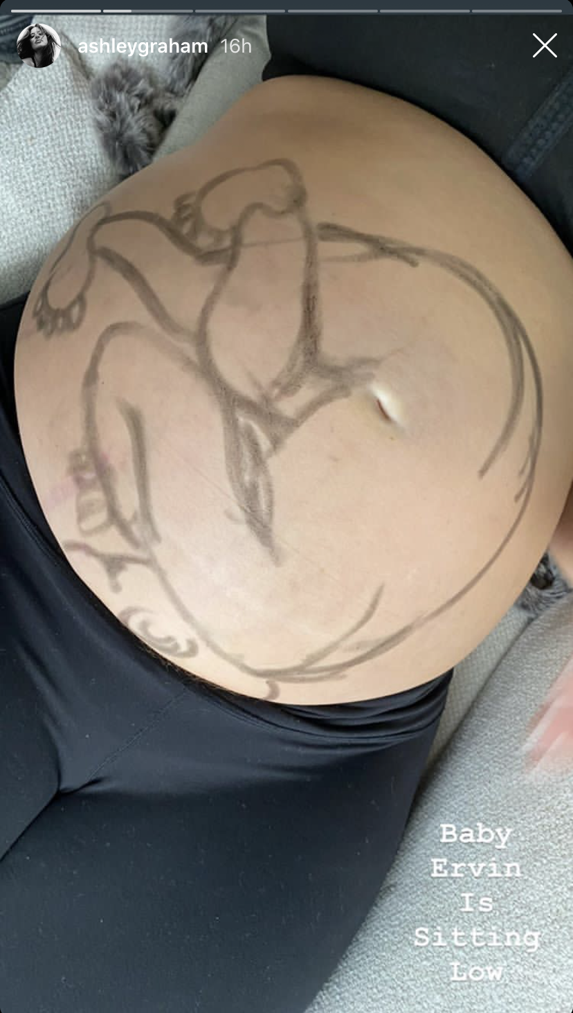 ashley-graham-baby-ervin-sitting-low