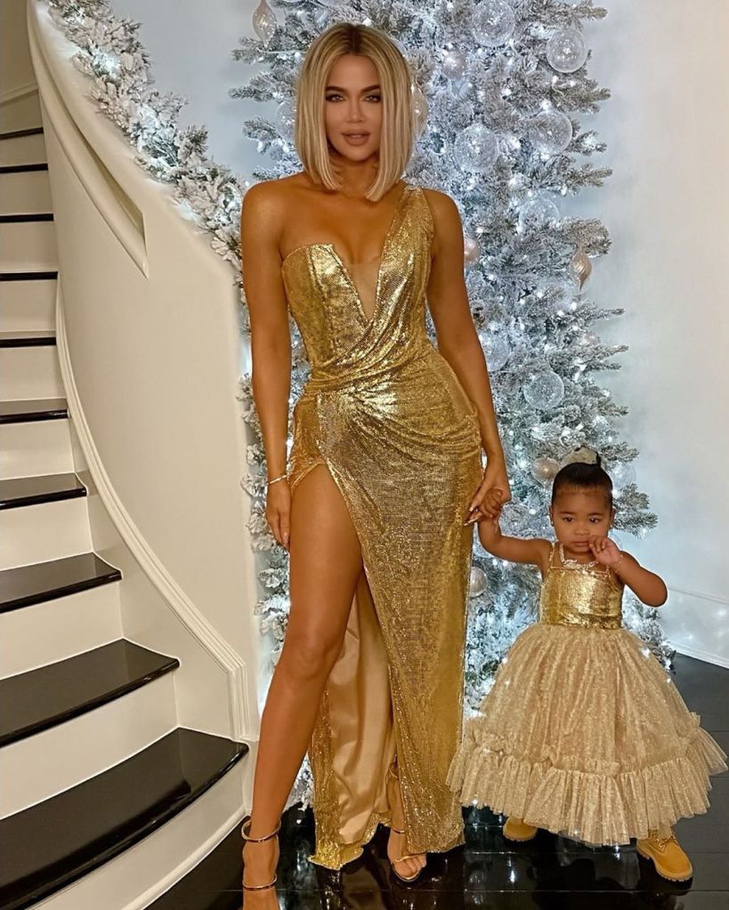 Khloe Kardashian and True Wear Matching Gold Dresses for Christmas