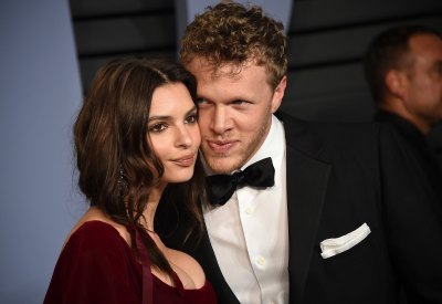 Emily Ratajkowski and husband Sebastian Bear-McClard Cuddle Up on the Red Carpet