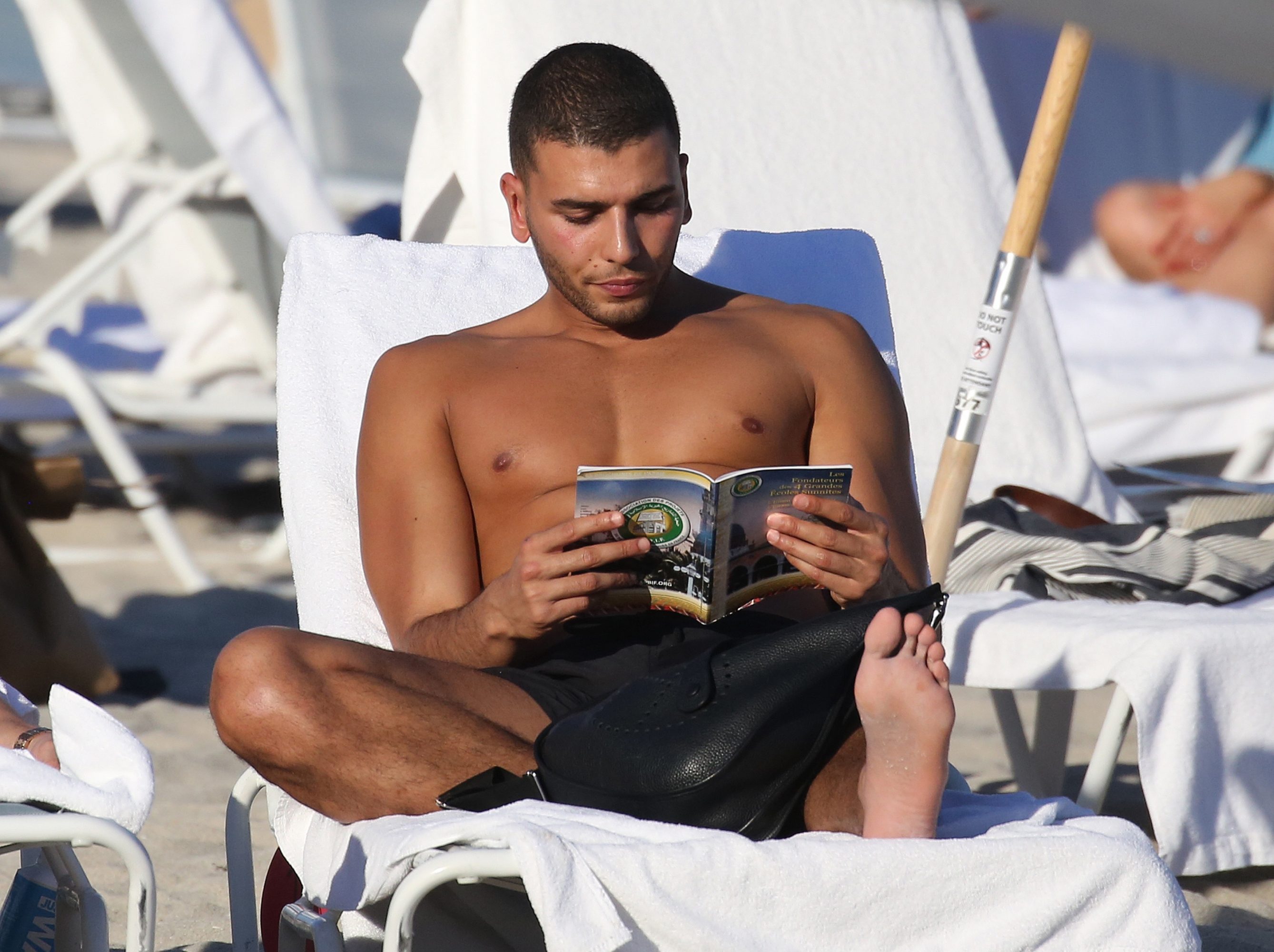 French Nude Beach Contest - Younes Bendjima Reads Shirtless Amid Renewed Romance With Kourtney