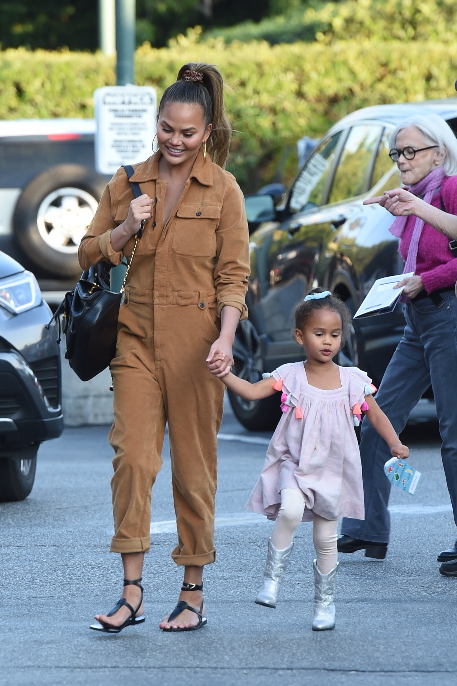 Chrissy Teigen and her daughter Luna go grocery shopping at Bristol Farms