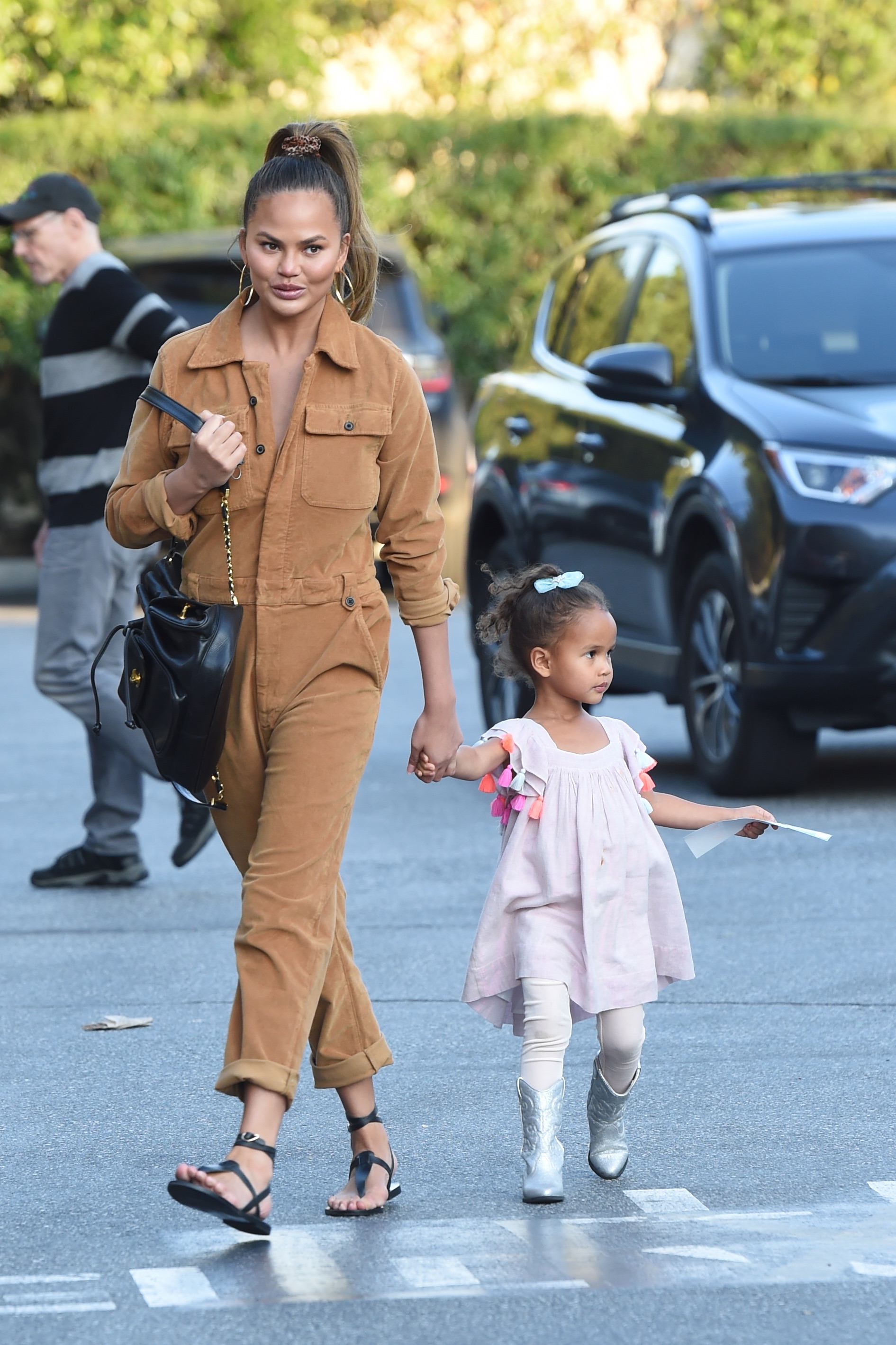 Chrissy Teigen and her daughter Luna go grocery shopping at Bristol Farms