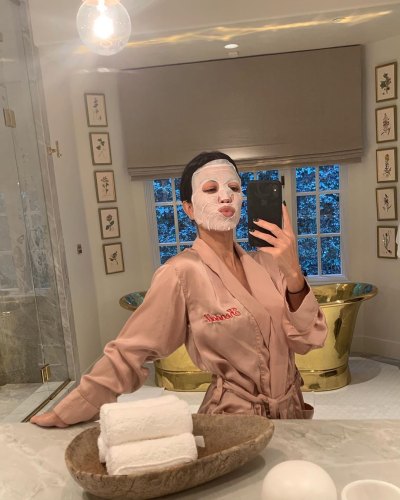 Kourtney Kardashian Poses for a Bathroom Selfie in Facemask