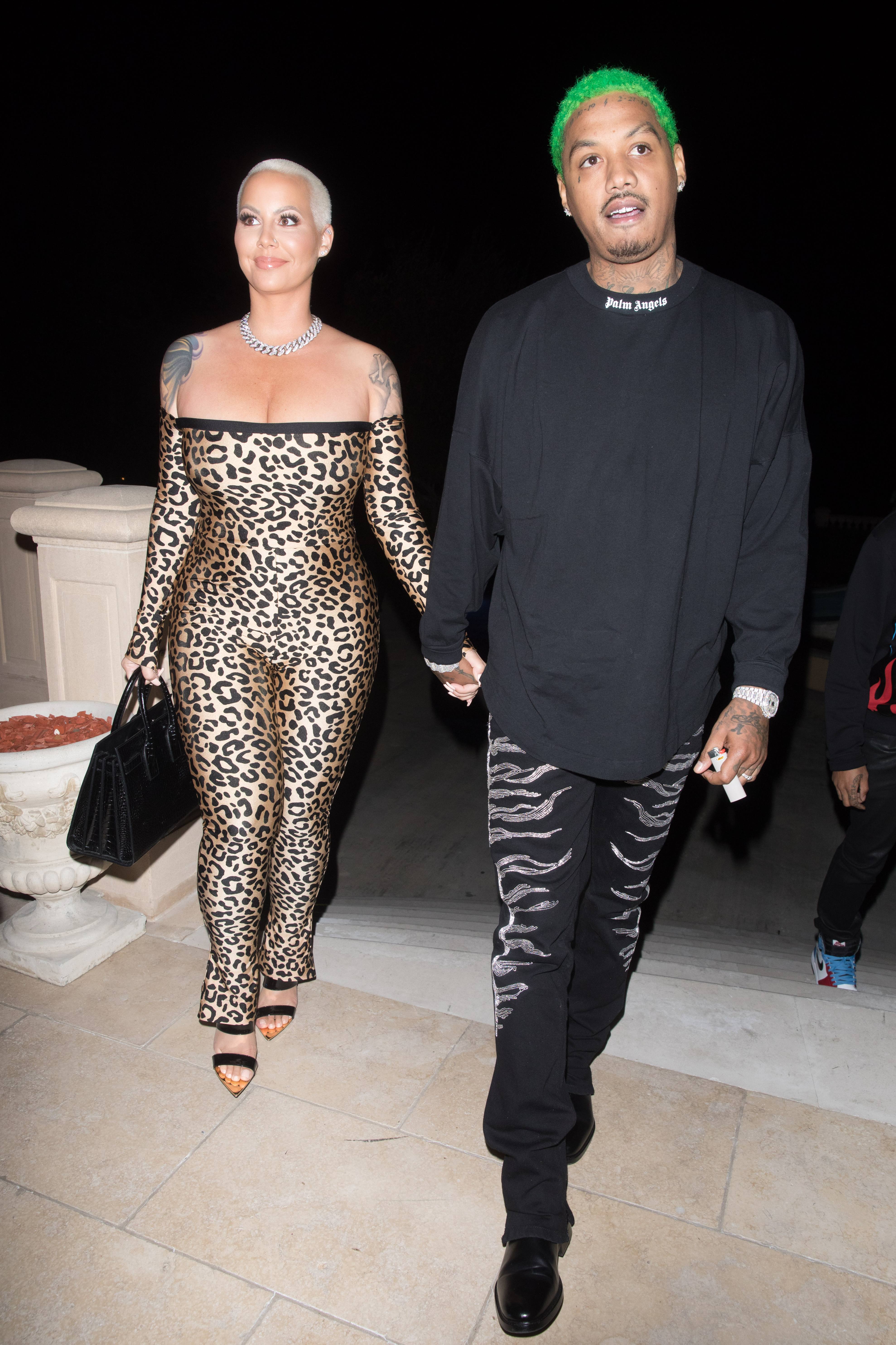 Amber Rose and Alexander Edwards Step Out at The Weeknds NYE Party picture
