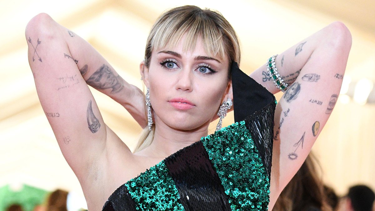 Miley Cyrus Tattoo Guide: Photos of Her Body Ink, Meanings