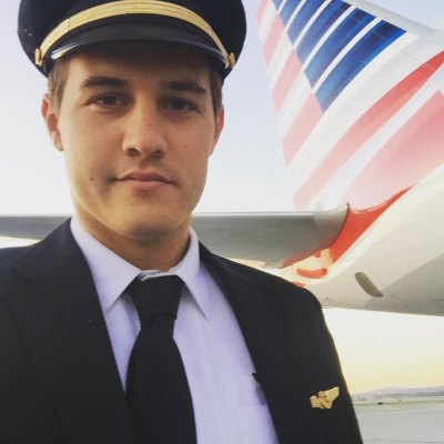 Peter Weber In Front of an Airplane