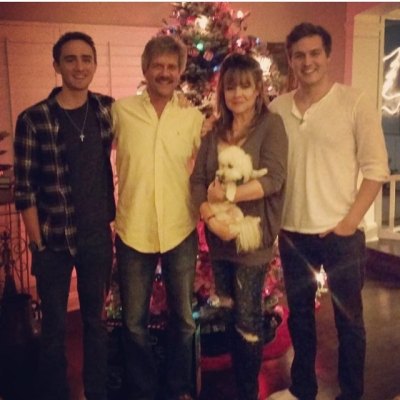 Peter Weber With His Dog and Family by the Christmas Tree