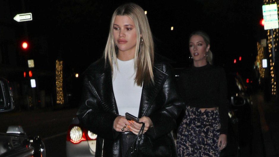 Sofia Richie Wears a Black Trench Coat While Grabbing Dinner With Friends in Beverly Hills