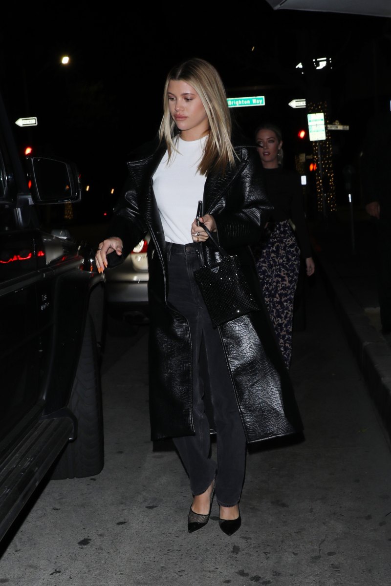 Sofia Richie Wears a Black Trench Coat While Grabbing Dinner With Friends in Beverly Hills