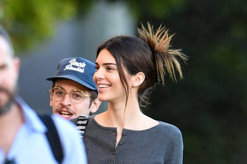 Kendall Jenner in a Crop Top and Jeans
