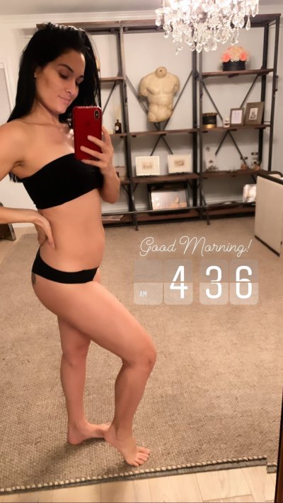Nikki Bella Shows Growing Baby Bump and Abs in Video