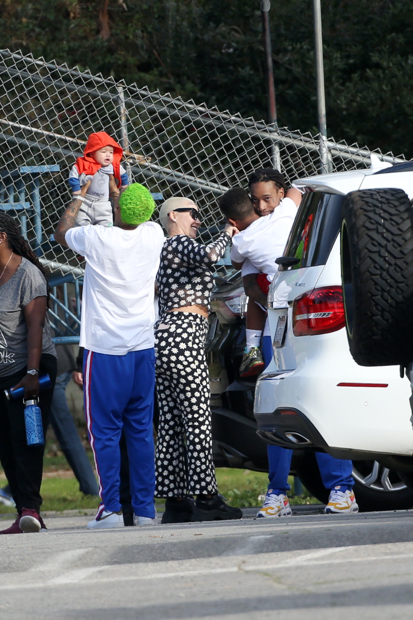 Amber Rose Attends Son's Baseball Game With Ex Wiz Khalifa and Her Baby Daddy Alexander
