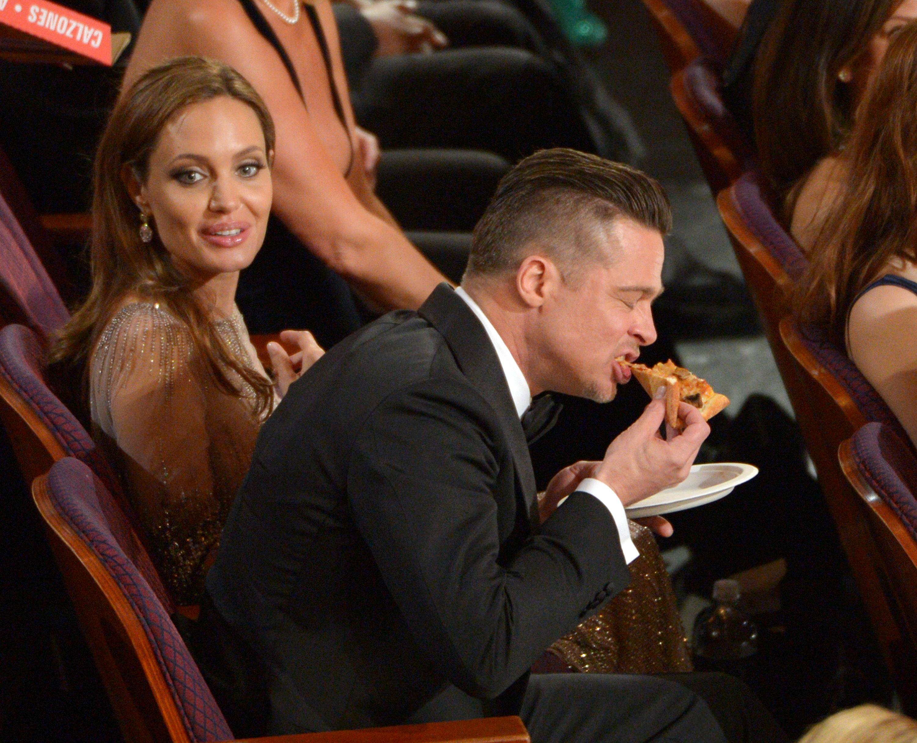 Brad Pitt in a Tuxedo Eating Pizza With Angelina Jolie