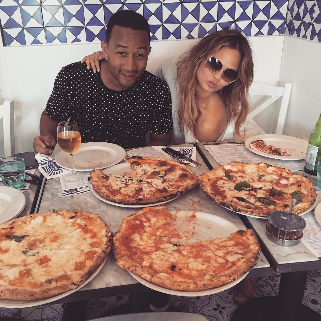 Chrissy Teigen and John Legend Eating Pizza