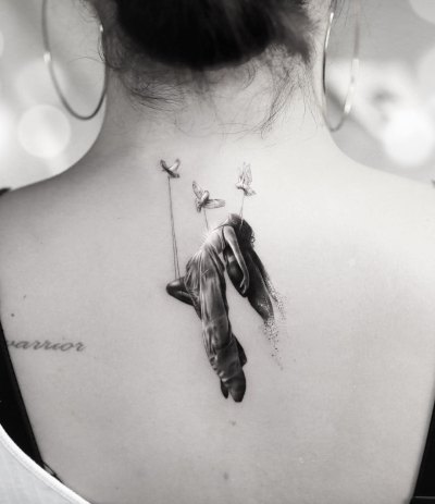 Demi Lovato Unveils New Back Tattoo 1 Year After Overdose
