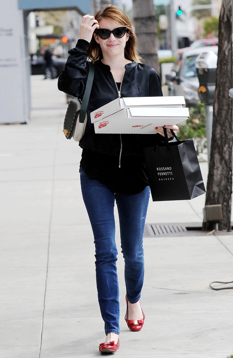 Emma Roberts Wearing Jeans and a Top With a Pizza Box