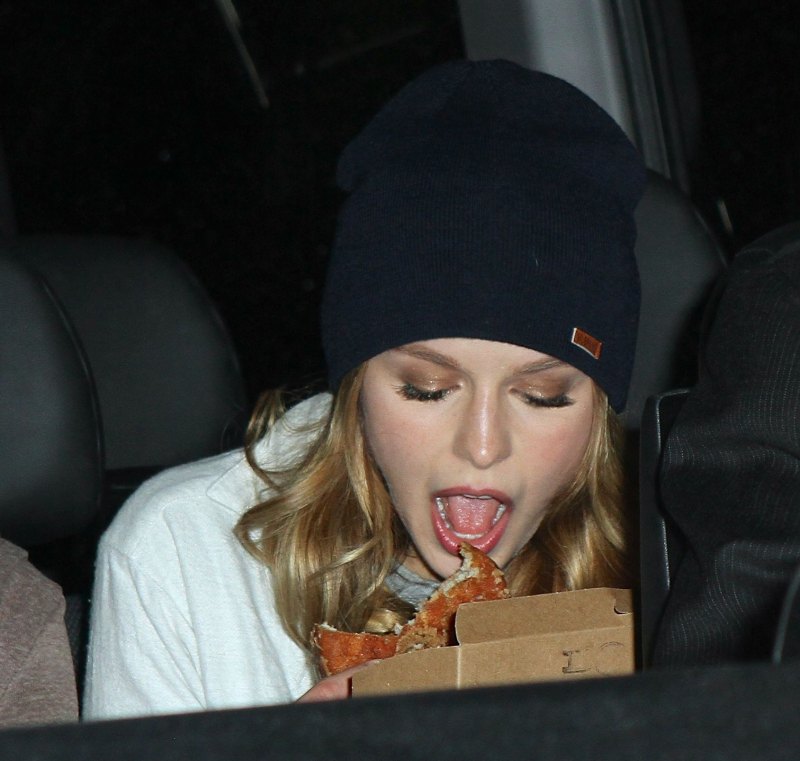 Melissa Benoist Eating Pizza