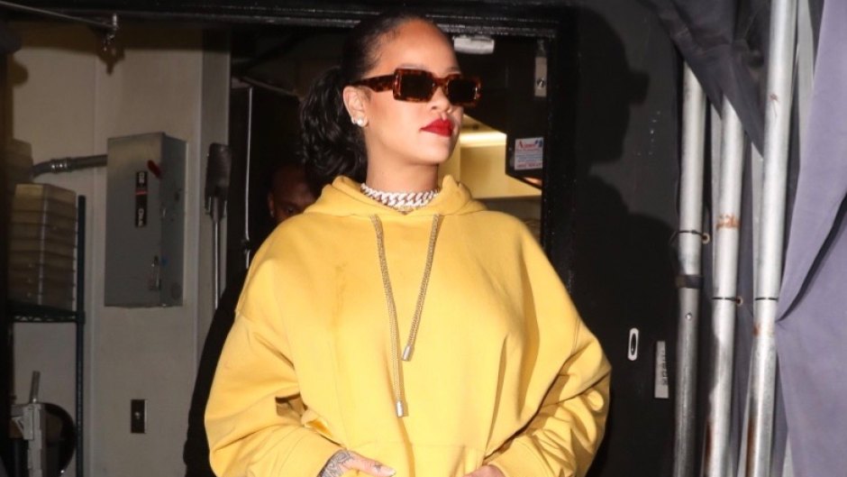 Rihanna Spotted Leaving The Nice Guy in L.A. Wearing a Yellow Skirt and Matching Sweatshirt