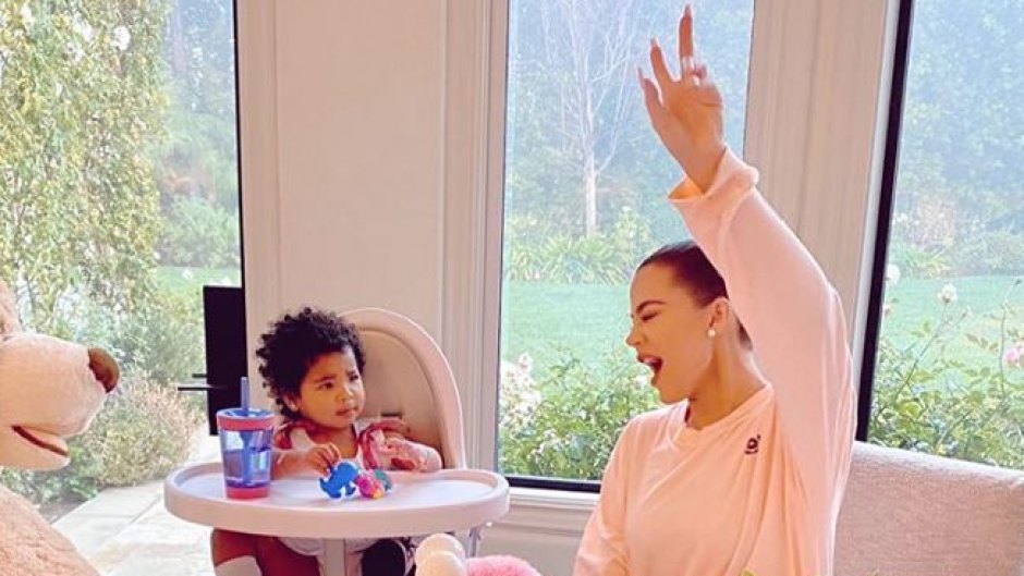 Khloe Kardashian Laughs and Gives Peace Sign While Spending the Morning With Daughter True Thompson in a High Chair