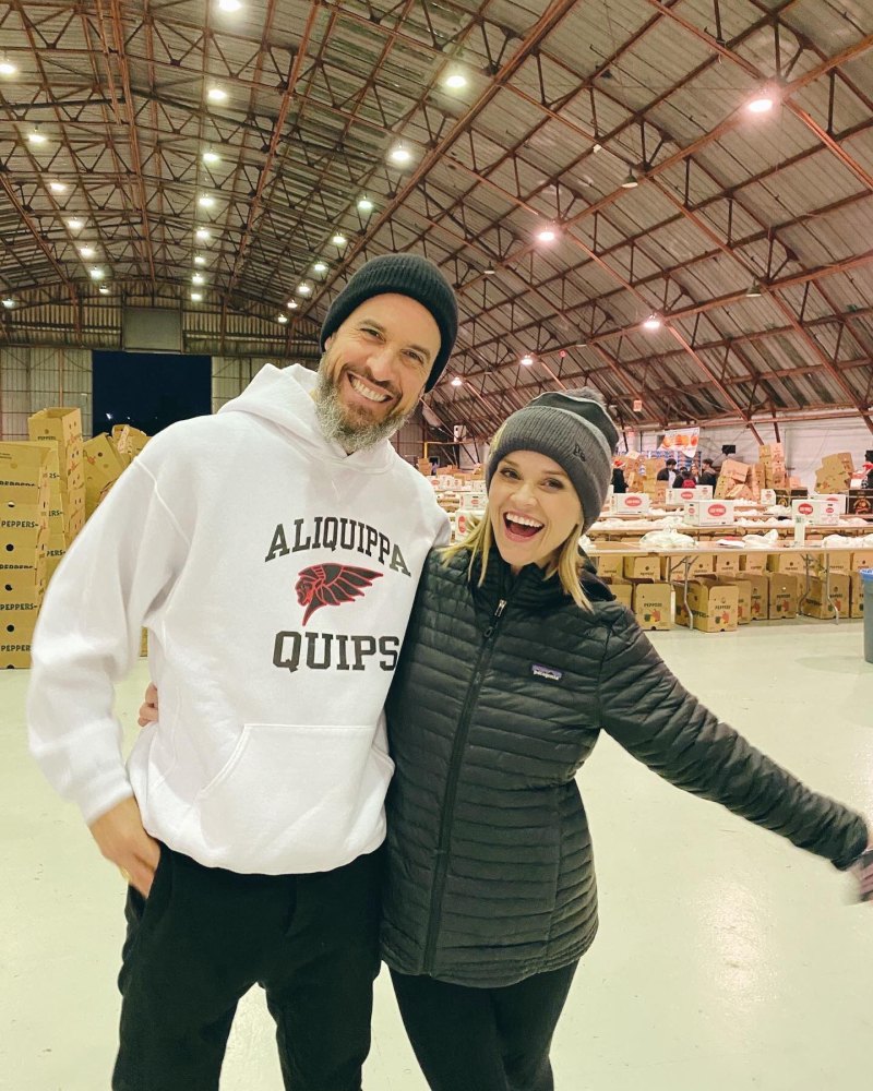 Reese Witherspoon and Husband Jim Toth Smiling in Coats