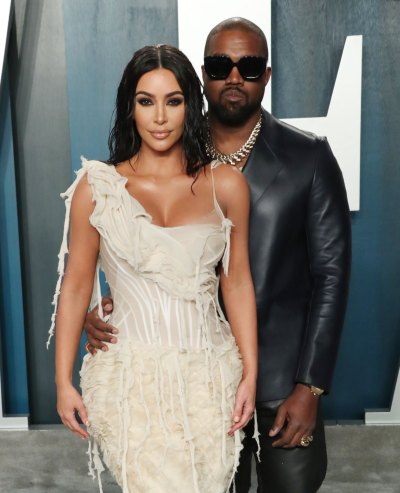 Kanye West Holds Wife Kim Kardashians Waist on Red Carpet for Vanity Fair Oscars party