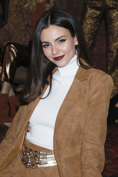 Victoria Justice Smiles at Alice and Olivia presentation, Fall Winter 2020, New York Fashion Week, USA - 10 Feb 2020 in Tan Jacket and White Turtleneck
