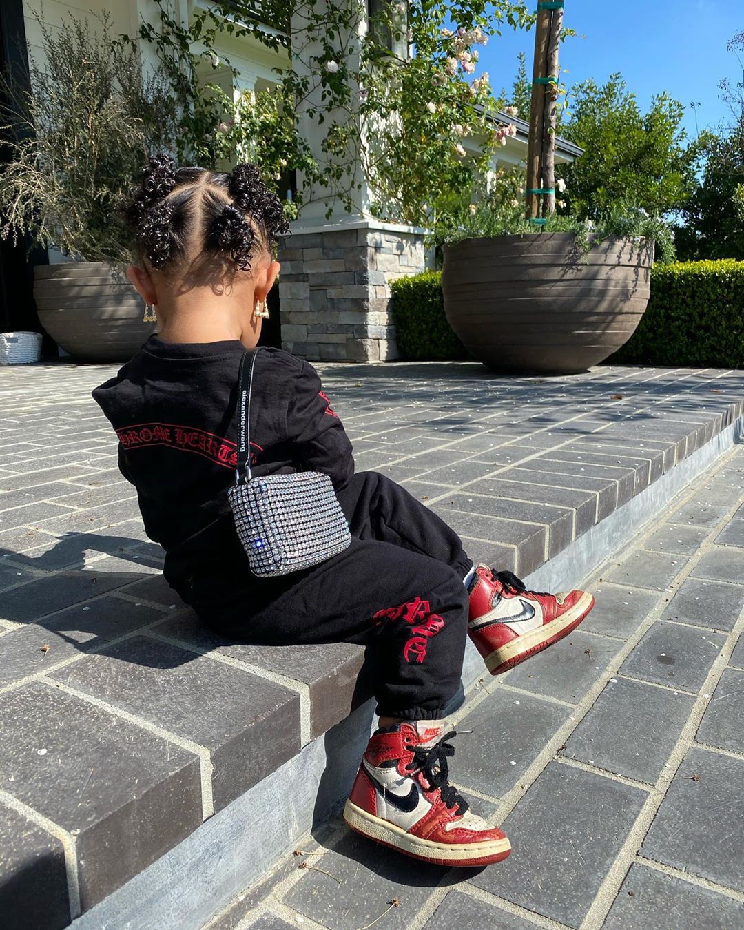 Stormi Webster Wearing Chrome Hearts and Alexander Wang Photographed by Kylie