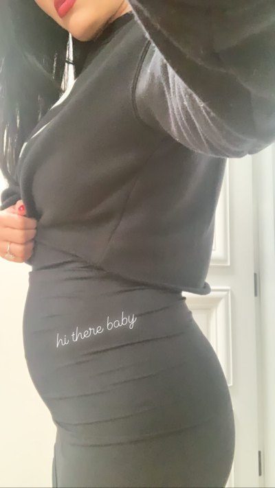 Nikki Bella Shows Growing Baby Bump in Tight Black Dress