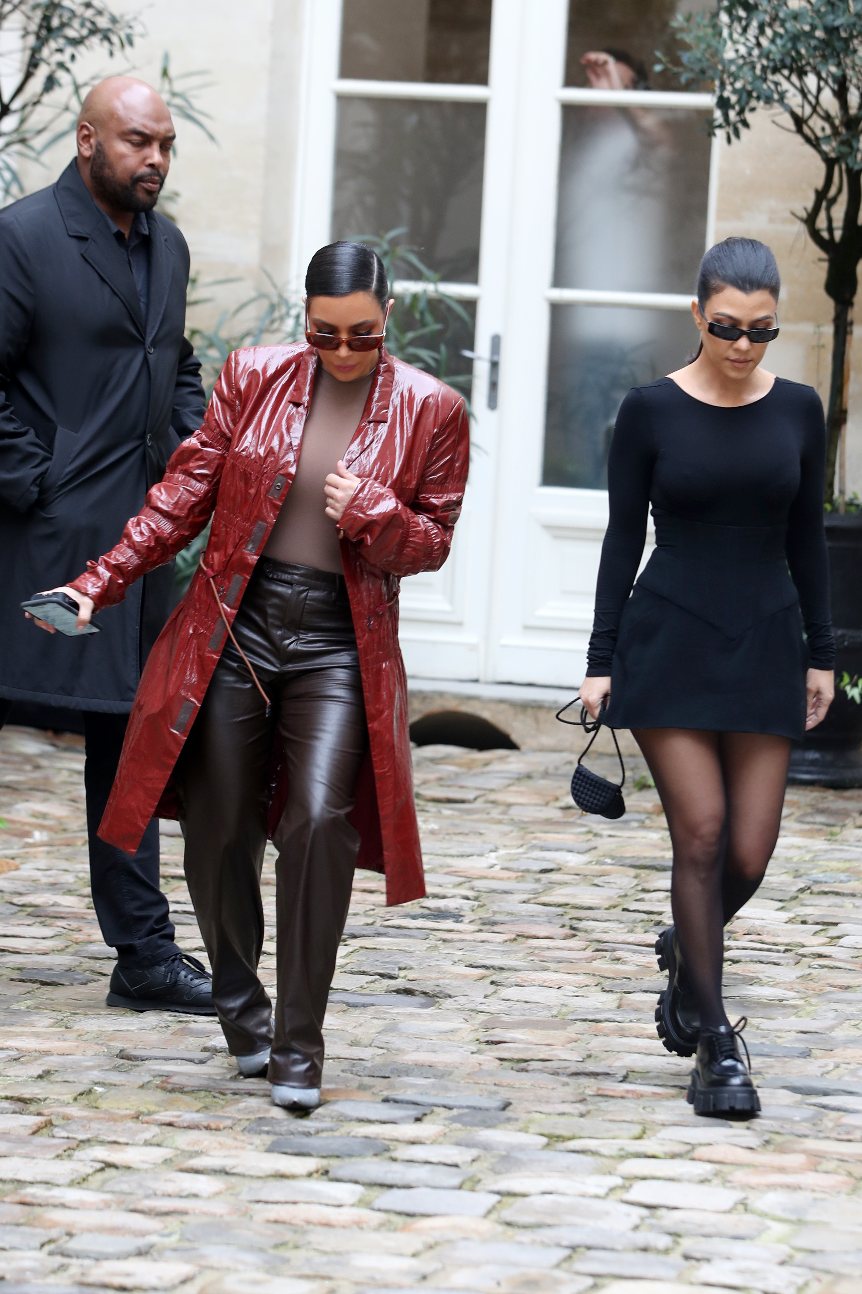 Kim Kardashian Nearly Falls During Paris Fashion Week Photos
