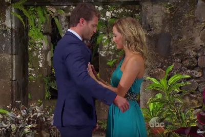 Bachelor Juan Pablo Galavis Stands in Blue Suit During Final Rose Ceremony With Contestant Clare Crawley in Teal One Shoulder Gown and She Pushes Him Back