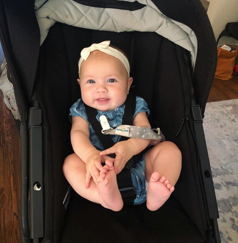 Sean Lowe and Catherine Giudici Daughter Mia in Baby Carrier