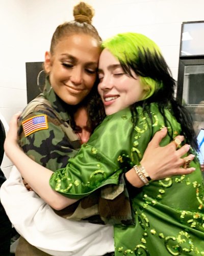 Billie Eilish Wears Green Outfit With Green and Black Hair While Hugging Jennifer Lopez and Daughter Emme