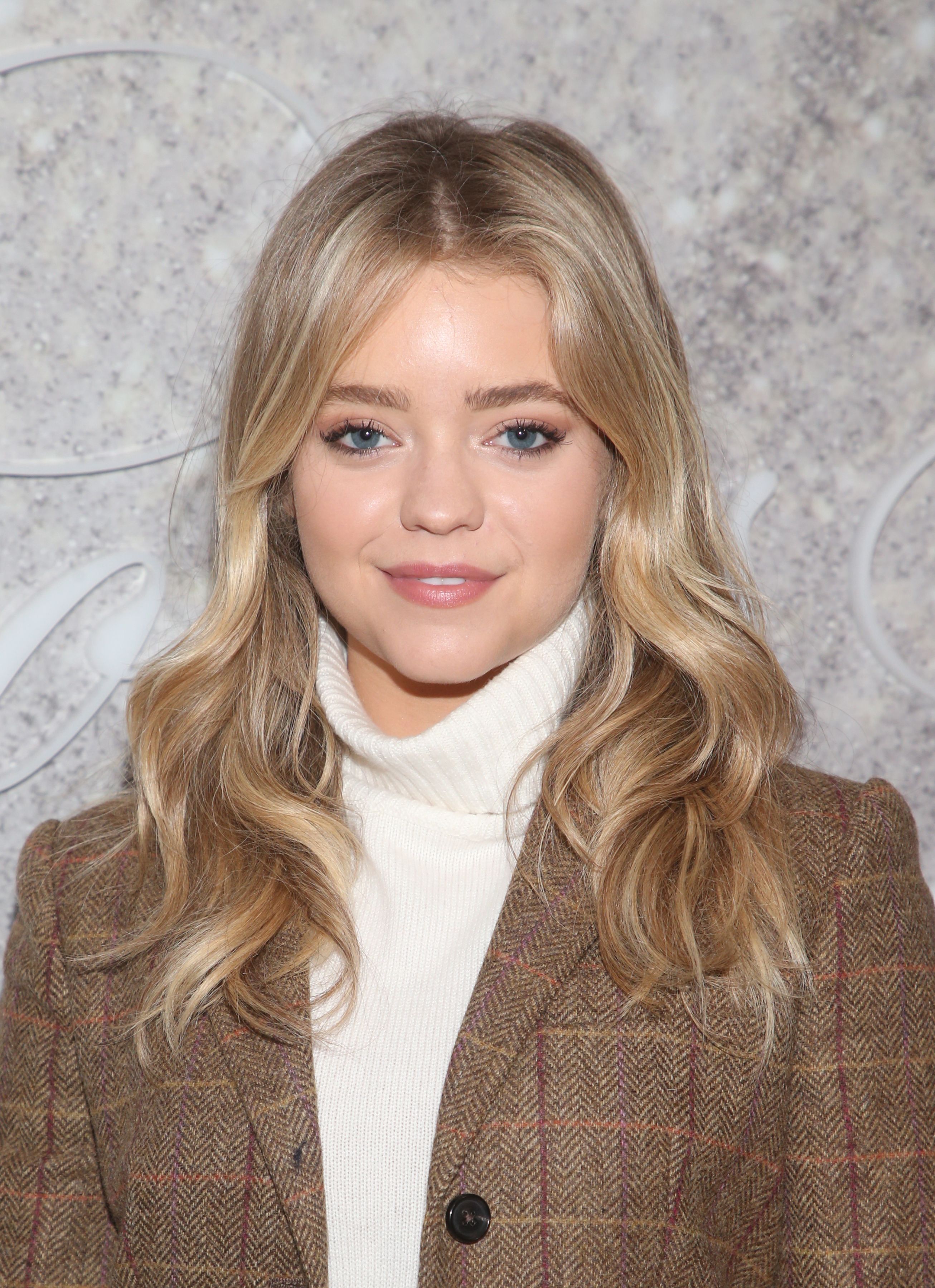 Jade Pettyjohn White Turtleneck and Brown Blozer