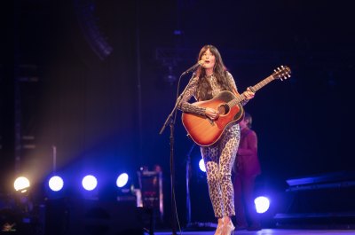 Kacey Musgraves Wears Jumpsuit While Playing Guitar on Stage