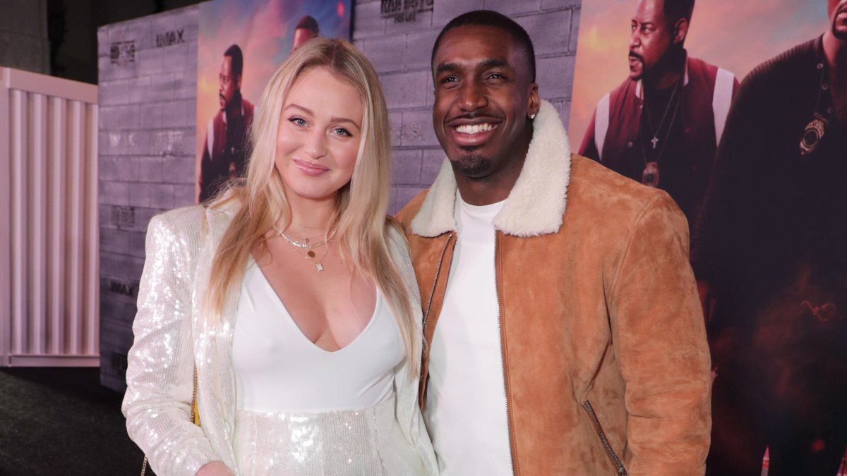Pregnant Iskra Lawrence Wears White Jumpsuit With Boyfriend Philip Payne in Brown Suede Jacket