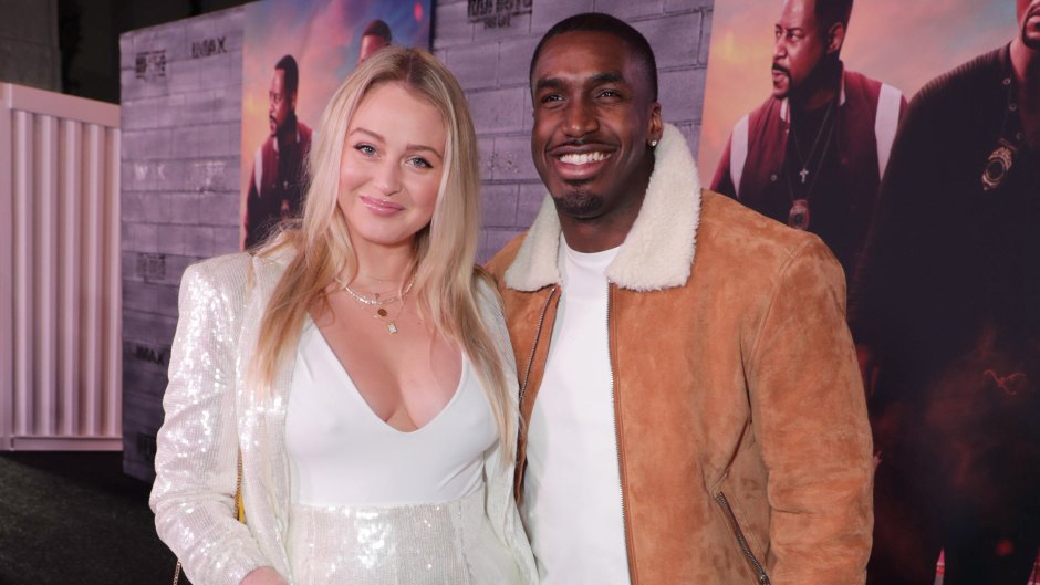 Pregnant Iskra Lawrence Wears White Jumpsuit With Boyfriend Philip Payne in Brown Suede Jacket