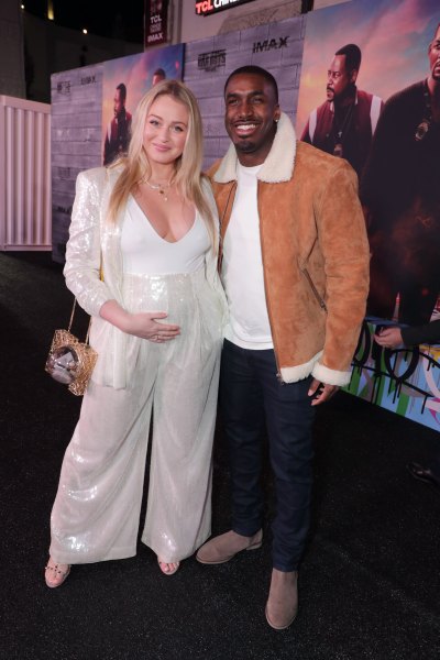 Pregnant Iskra Lawrence Wears White Jumpsuit With Boyfriend Philip Payne in Brown Suede Jacket