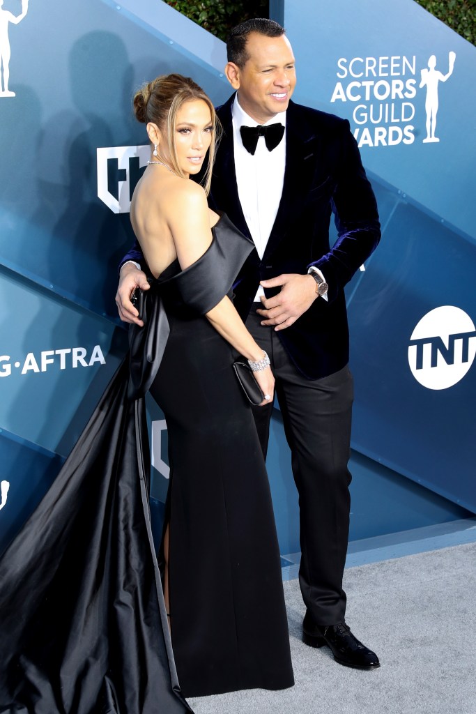 Jennifer Lopez wears Black Off the Shoulder Gown With Alex Rodriguez in Black Tux